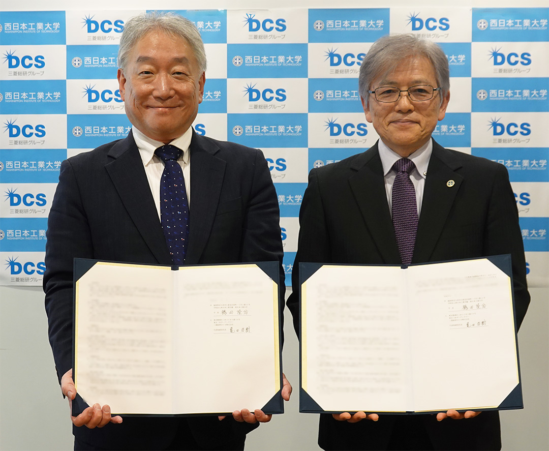 西日本工業大学と三菱総研ＤＣＳとの包括連携協定式の様子