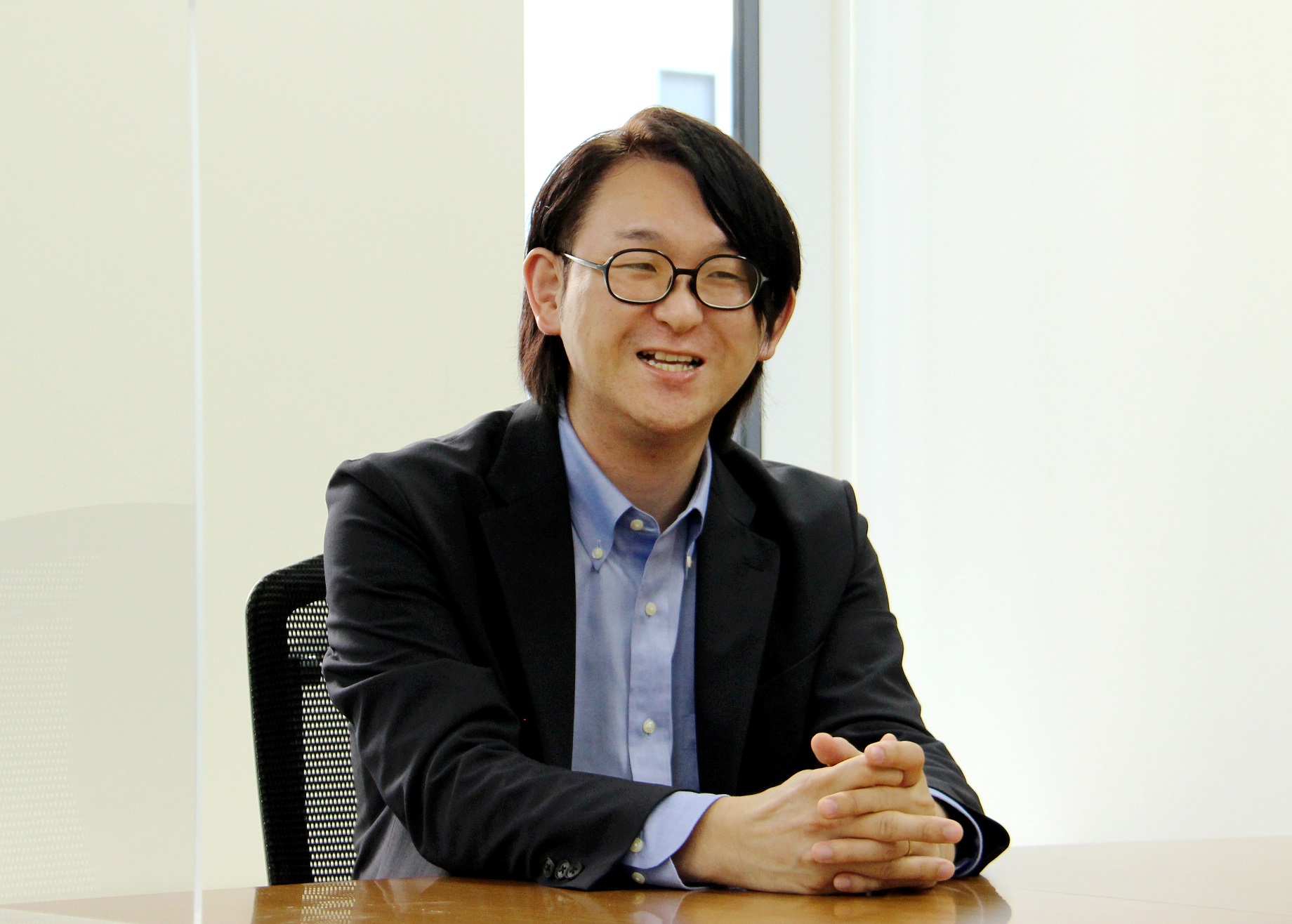 ビジネスサービス本部 HR開発部 共通グループ 課長 香取 要 写真