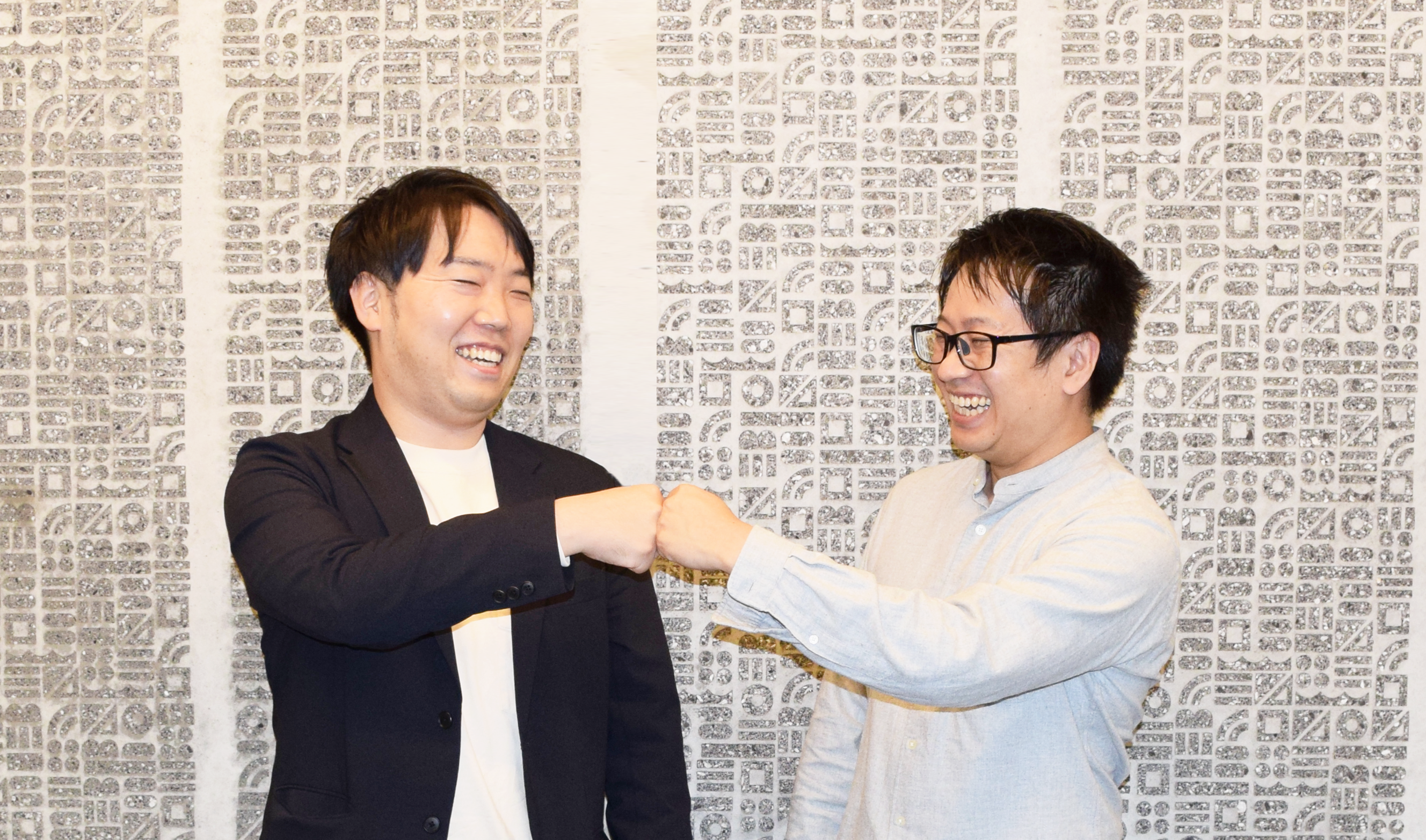 最優秀賞を喜ぶ 戸田建設 斎藤寛彰氏と三菱総研DCS 中島直樹